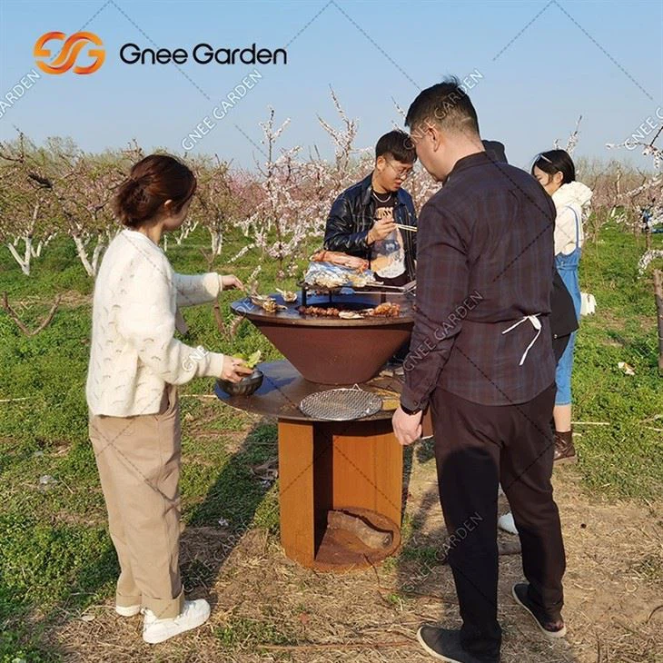 Metal Outdoor Fire Pit With BBQ Grill